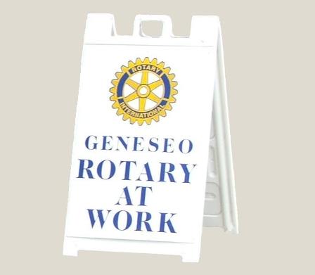 Geneseo Rotary Club sign board 
with Rotary Emblem and the words Geneseo Rotary
at Work 